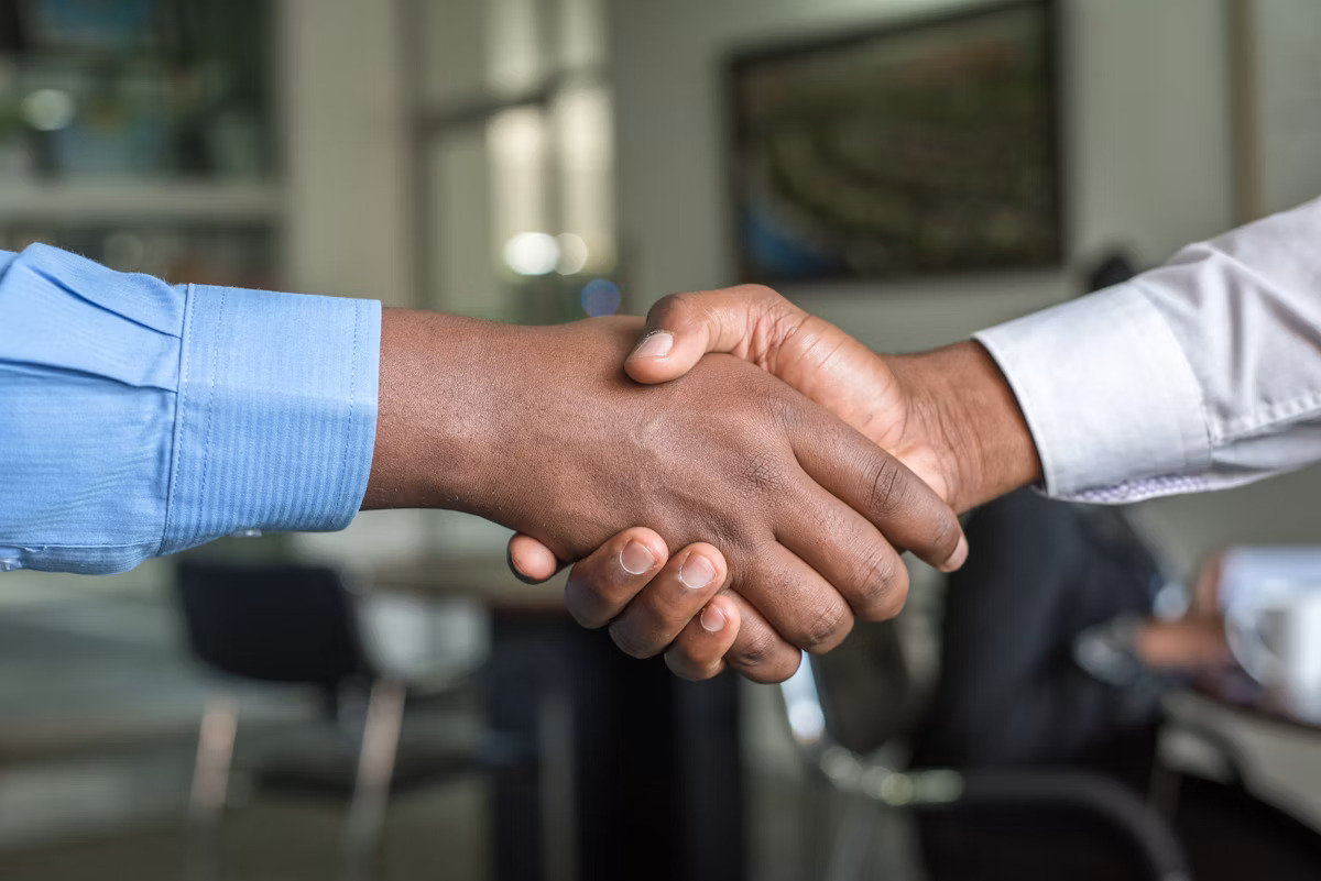 Employer and candidate shaking hands